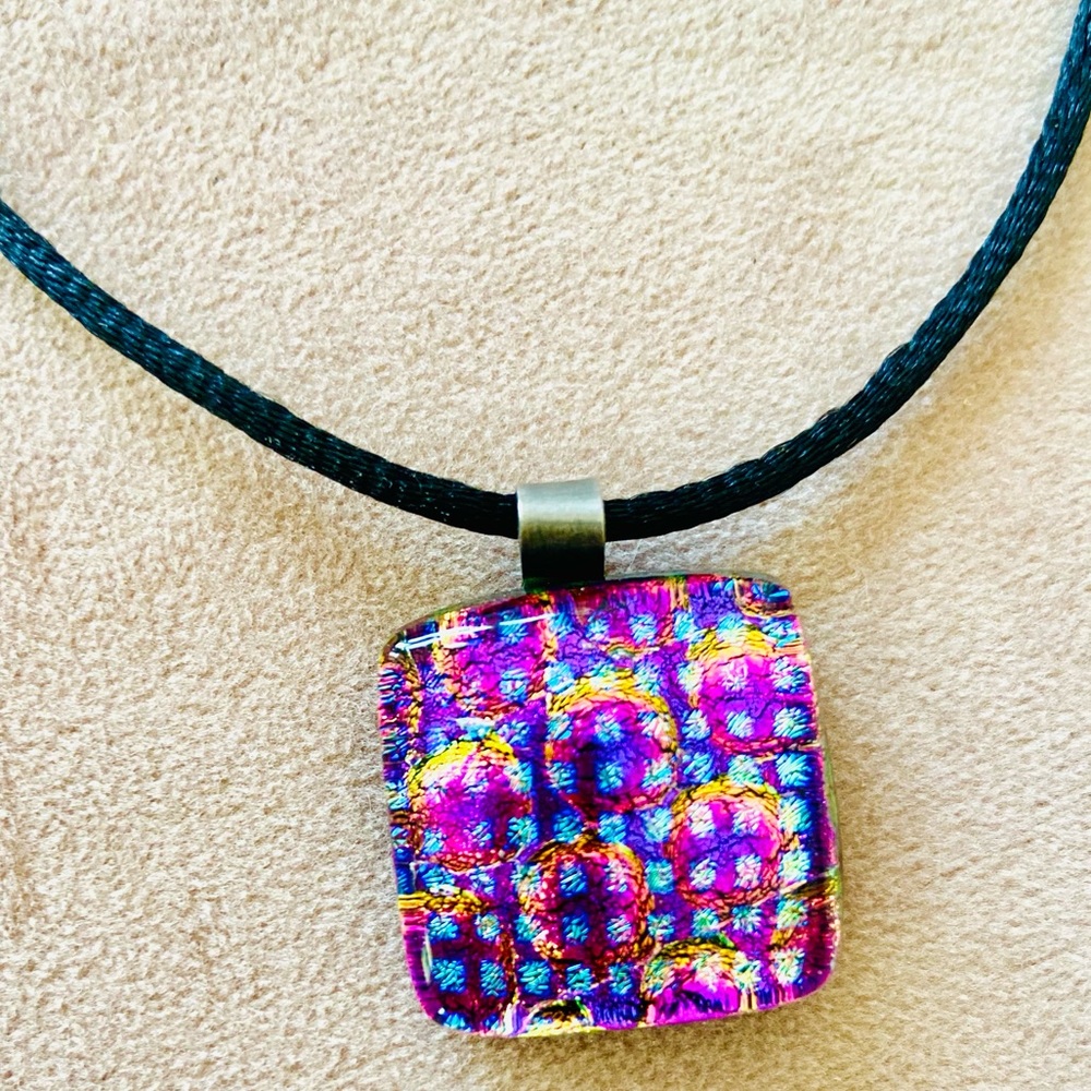 Handcrafted glass pendant, signed. Bought in Carmel, CA, from artist in 2005.